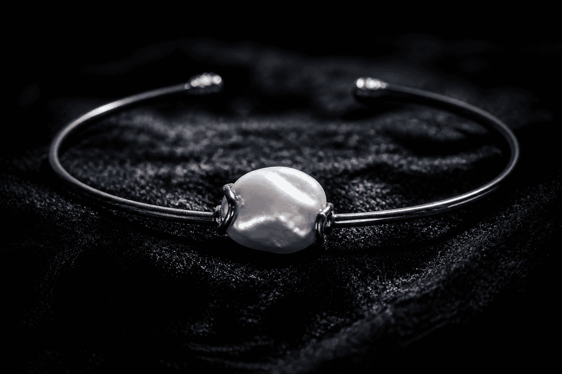 Pearl and blackened silver cuff on black velvet